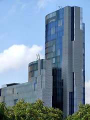 Image showing Modern skyscraper and trees