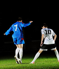 Image showing football players in action for the ball