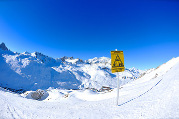 Image showing Sign board at High mountains under snow in the winter