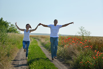 Image showing happy couple in wheat field