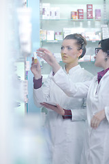 Image showing team of pharmacist chemist woman  in pharmacy drugstore