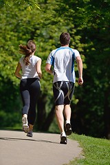 Image showing Young couple jogging at morning