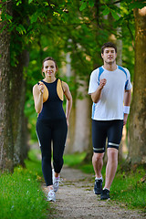 Image showing Young couple jogging