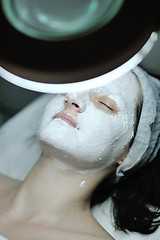 Image showing woman with facial mask in cosmetic studio