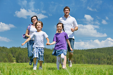 Image showing happy young family have fun outdoors