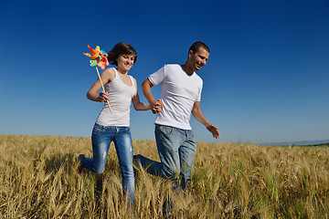 Image showing happy couple in wheat field