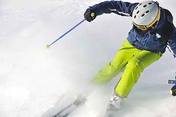 Image showing skiing on fresh snow at winter season at beautiful sunny day