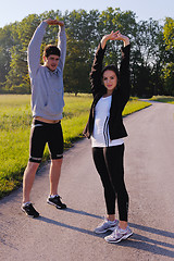 Image showing Young couple jogging