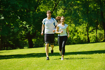 Image showing Young couple jogging at morning
