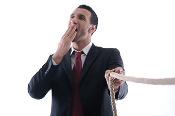 Image showing business man with rope isolated on white background