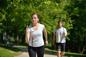 Image showing Young couple jogging at morning