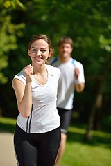 Image showing Young couple jogging at morning