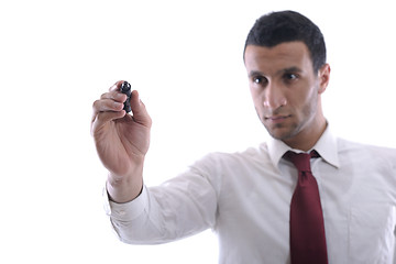 Image showing business man draw with marker on empty space