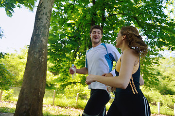 Image showing Young couple jogging at morning