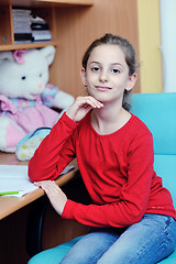 Image showing girl doing homework