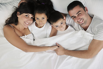 Image showing happy young Family in their bedroom