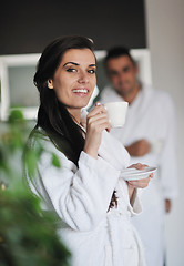 Image showing Young love couple taking fresh morning cup of coffee