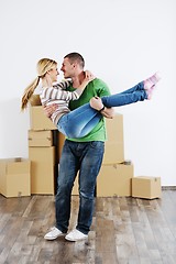 Image showing Young couple moving in new house