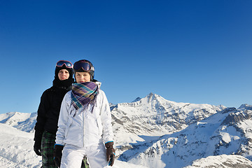 Image showing winter portrait of friends at skiing