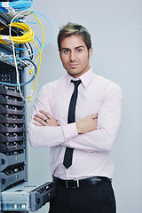 Image showing young it engineer in datacenter server room