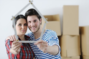 Image showing Young couple moving in new house