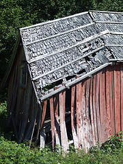 Image showing Collapsing wooden house