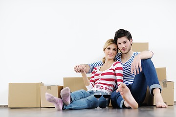 Image showing Young couple moving in new house