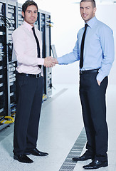 Image showing it enineers in network server room