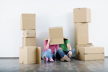 Image showing Young couple moving in new house