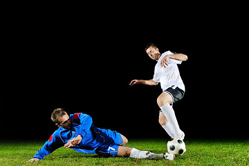 Image showing football players in action for the ball