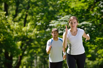 Image showing Young couple jogging