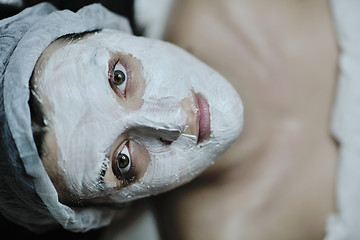 Image showing woman with facial mask in cosmetic studio