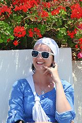 Image showing Greek woman on the streets of Oia, Santorini, Greece