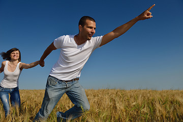 Image showing happy couple in wheat field