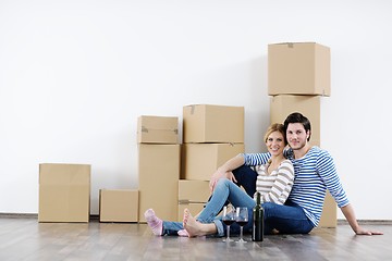 Image showing Young couple moving in new house