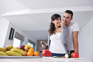 Image showing young couple have fun in modern kitchen