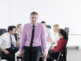 Image showing young business man at meeting