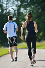 Image showing Young couple jogging at morning