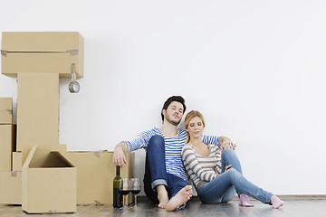 Image showing Young couple moving in new home