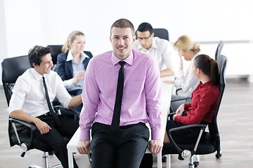 Image showing young business man at meeting