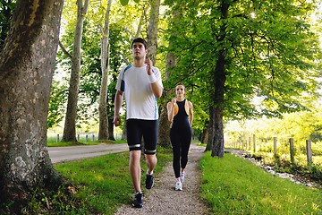 Image showing Young couple jogging