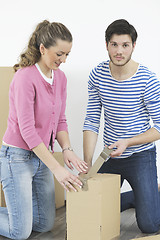 Image showing Young couple moving in new home