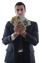 Image showing Business man holding money