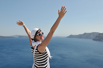 Image showing Greek woman on the streets of Oia, Santorini, Greece