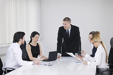 Image showing business people in a meeting at office