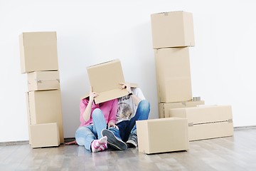 Image showing Young couple moving in new house