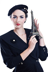 Image showing beautiful young woman with paris symbol eiffel tower