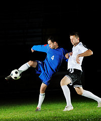 Image showing football players in action for the ball