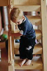 Image showing beautiful young child making first steps