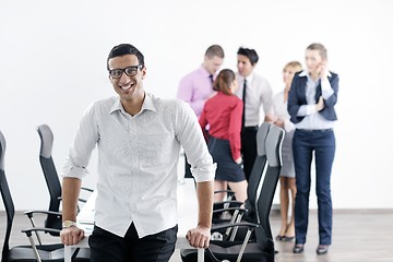 Image showing young business man at meeting